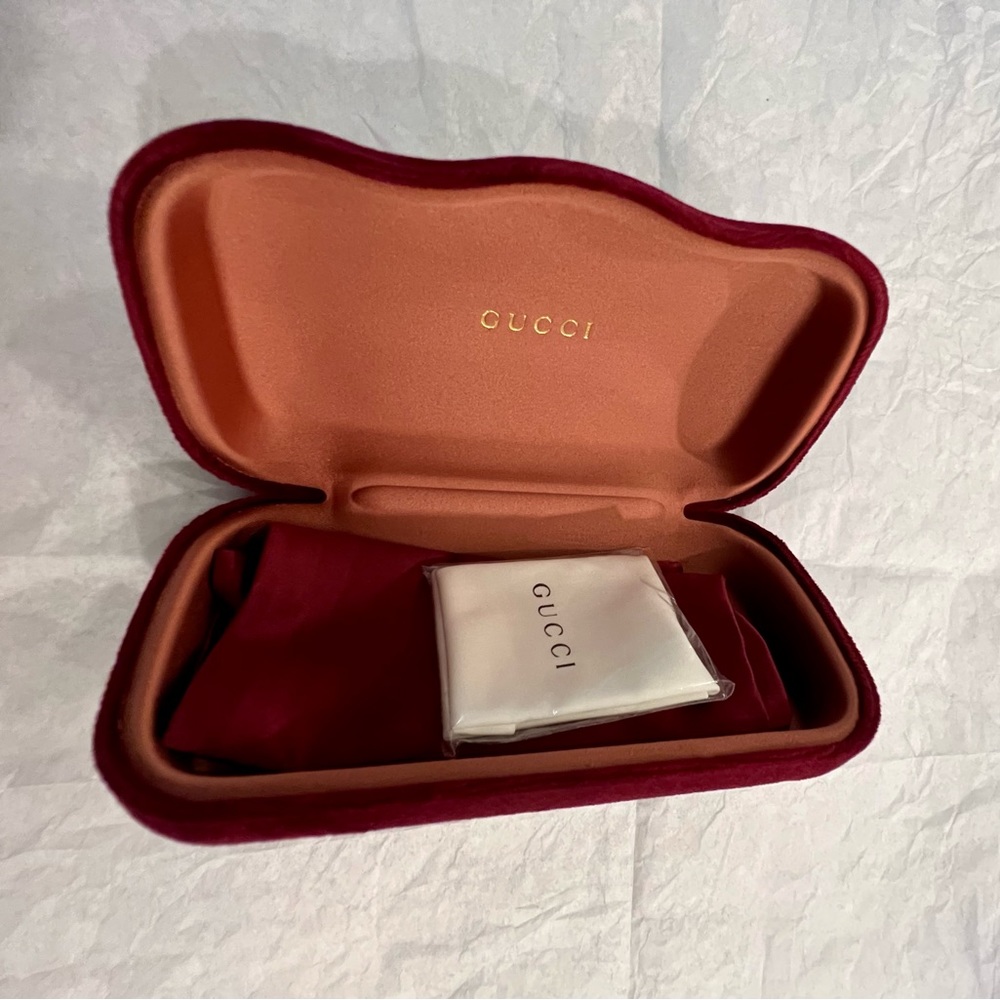 Gucci burgundy eyeglasses case, dust bag and lens cloth.